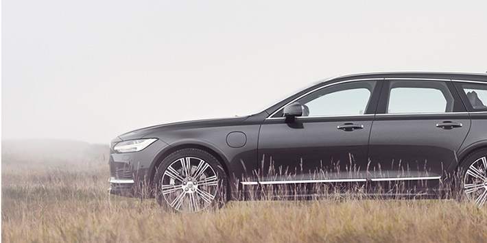 Photo of an unmanned Volvo estate stalking lions in the savannah